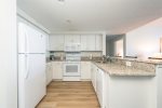 Fresh recently renovated kitchen with granite counters